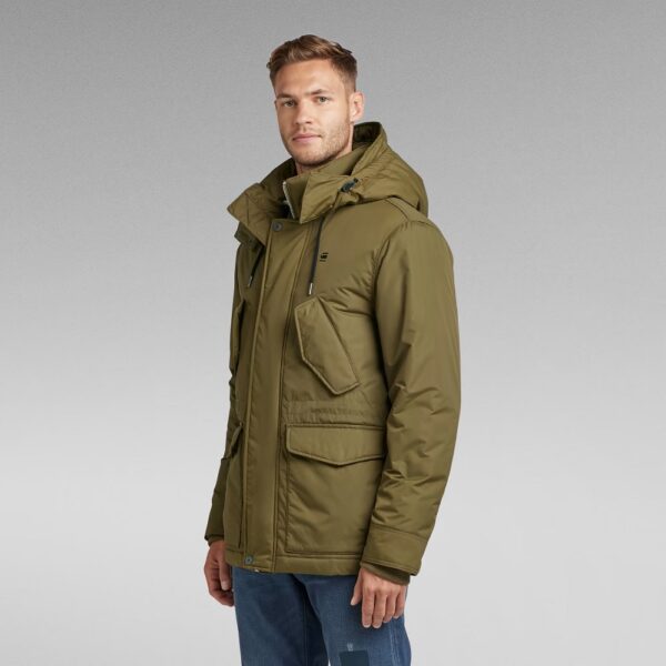 G-STAR RAW - VESTE VODAN PADDED HOODED VERT FONCE POUR HOMMES  ,Cette doudoune ultra longue est dotée d’une grande capuche avec un col montant et une visière allongée.